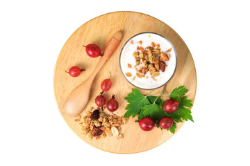 Smoothies with red gooseberry and muesli on a wooden stand