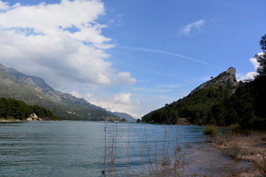 spanish  reservoir of Guadalest, an enlarged natural or artificial lake, storage pond or impoundment 