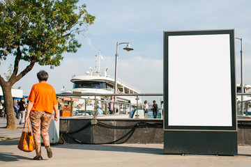 An empty billboard for advertising on the street near the seaport in Istanbul, Turkey. Street...