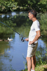 Man fishing in a river