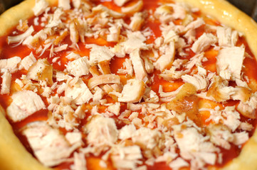 Fototapeta na wymiar Homemade pizza, process of cooking close up