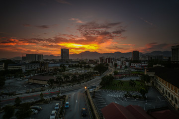 scenery of sunset with light trail at Ipoh Perak. motion blur,soft focus due to long exposure