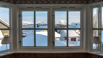 View of Tromsdalstiden from symmetrical window frame from Kvaløya near Tromso, Tromsø, Norway