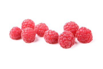 Raspberry on a glossy surface