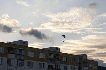 Paraglider flying in the air during colorful sunset. Slovakia