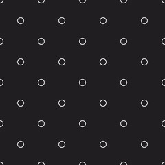 Seamless pattern of tiny circles arranged in a regular or formal manner. Minimal style classic background texture for print, textile, or web usage.