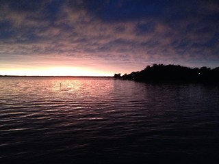 Obraz na płótnie Canvas Sunset by the Lake