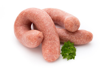 Raw sausages with herbs and spices.