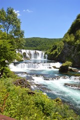 Fototapeta na wymiar Natural river waterfall
