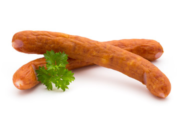 Stack of smoked sausages isolated on a white background.