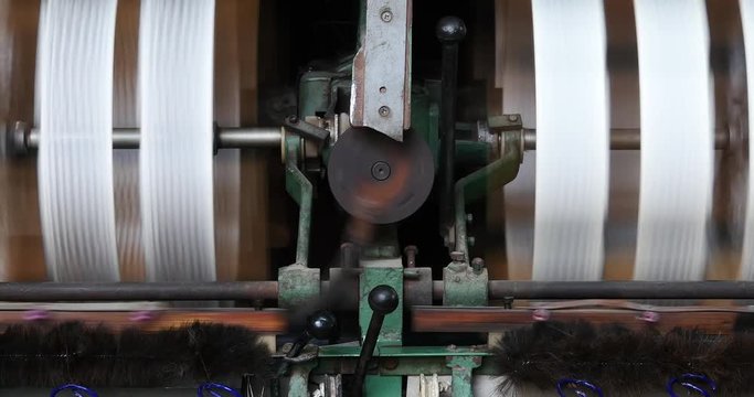 4k Machine Producing Tissues In A Silk Factory,Spinning Machine Collect silk Threads,silk textile factory production line,Workers reeling at workshop.