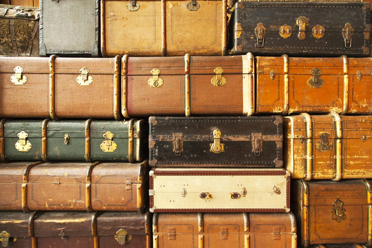 Old travel suitcases, abstract travel background