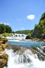 Fototapeta na wymiar Natural river waterfall