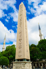 The Obelisk of Theodosius; Hippodrome Square and Minaret of sultanahmet mosque and blue cloudy skies
