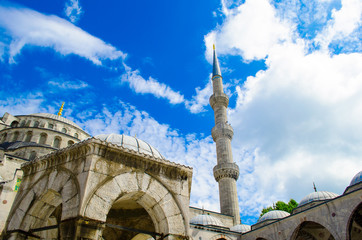 Minaret of sultanahmet mosque and blue cloudy skies