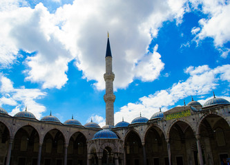 Fototapeta na wymiar Minaret of sultanahmet mosque and blue cloudy skies