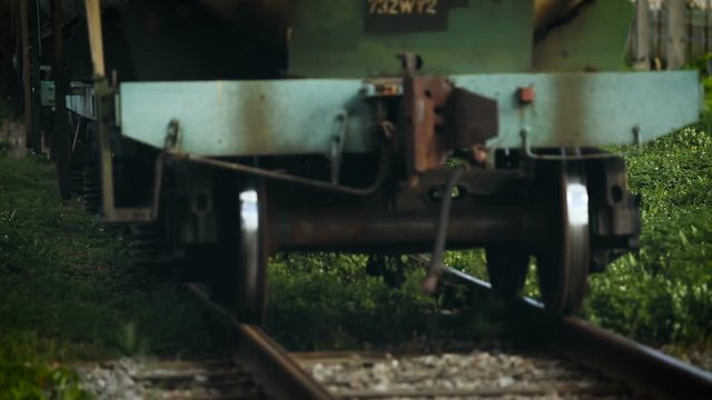 Railway. Industrial Train Coming Close. Iron Wheels Rotating. Old Fashion Transport. Rich Succulent Grass. Summer