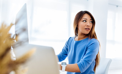 Young asian woman working in the office