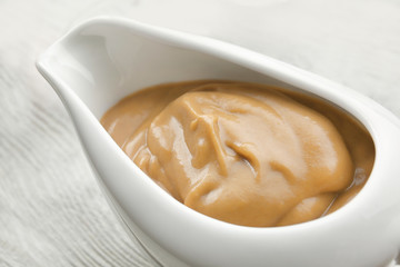 Sauce boat with turkey gravy, closeup
