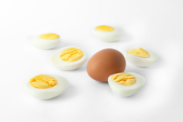 Hard boiled eggs on white background. Nutrition concept