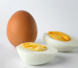 Hard boiled eggs on white background. Nutrition concept