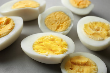 Sliced hard boiled eggs, closeup. Nutrition concept