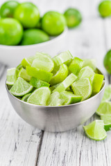Wooden table with Lime Slices (selective focus)