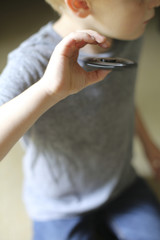Little Boy Playing with a Fidget Spinner