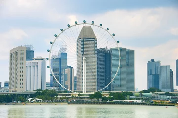 Zelfklevend Fotobehang Singapore Ferries Wheel and skyscrapers © joyt