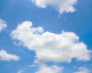 blue sky background with tiny clouds