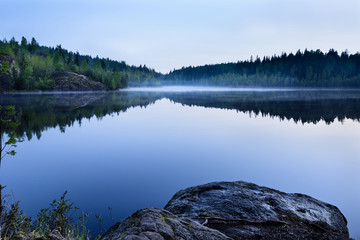 Lake Covered With Morning Mist, Karelia landscape Scandinavia Travel destination.