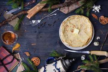 Overhead view of pancakes topped with butter, Christmas breakfast
