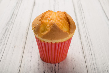 homemade cup cake on a wood background