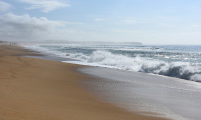 Wave and sand beach for background. Beautiful beach surface texture. Sea wave on sand beach digital illustration. Oceanic water tide on seashore. Belmont beach, Australia.