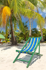 Obraz na płótnie Canvas Beach chair on the beach