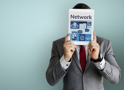Man holding digital device network graphic overlay - Powered by Adobe