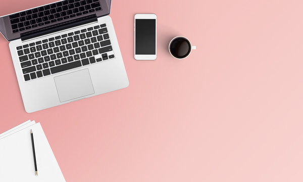 Modern workplace with notebook, coffee cup, smartphone and eyeglasses copy space on color background. Top view. Flat lay style.