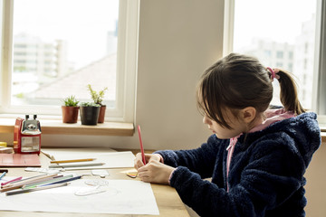 Naklejka premium Little Kid Drawing Sketching Cute Adorable