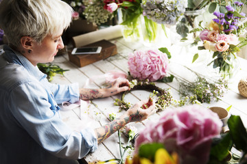 Florist Making Fresh Flowers Crown Arrangement