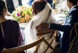 Groom Hand on Bride Chair Wedding Reception