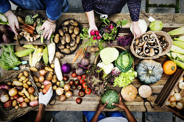 Aerial view of fresh organic various vegetable on wooden table