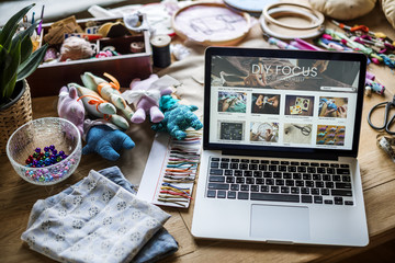 Handiwork objects laptop on the table