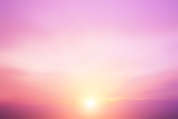 The blur pastels gradient sunset background on soft nature sunrise peaceful morning beach outdoor. heavenly mind view at a resort deck touching sunshine, sky summer clouds.