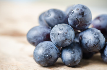 Red grape on wooden background,Healthy fruit