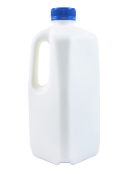 Big plastic bottle of milk isolated on white background