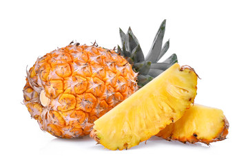 ripe whole and half pineapple isolated on white background