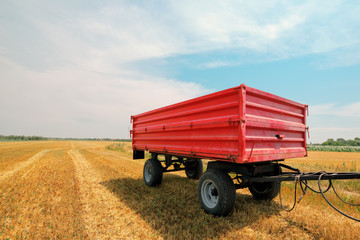 Fototapeta premium Agricultural tractor trailer