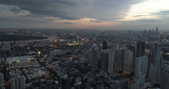 Aerial drone view timelapse of Bangkok during beautiful cloudy sunset