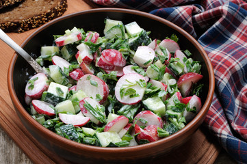 Salad from radish and cucumber