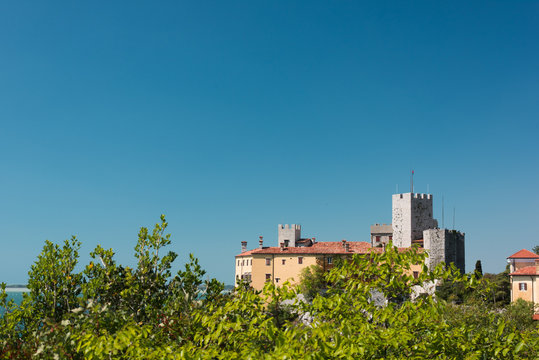 The castle of Duino and the beauty of the cliffs on the rocky coast